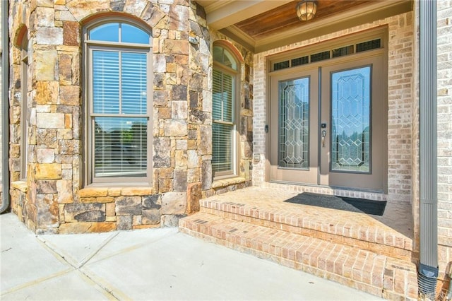5121 Hope Ct SW, Lilburn, GA 30047 - doorway to property featuring stone siding
