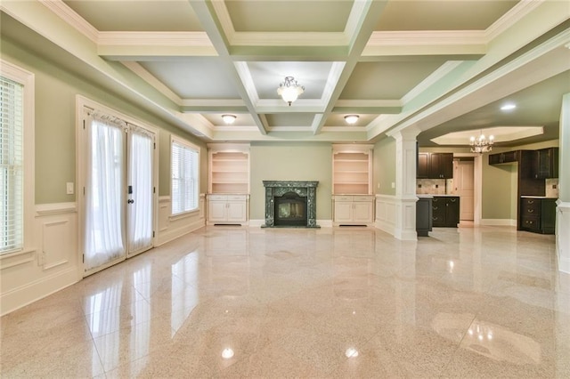 5121 Hope Ct SW, Lilburn, GA 30047 - unfurnished living room with granite floors, a decorative wall, a fireplace with raised hearth, decorative columns, and ornamental molding