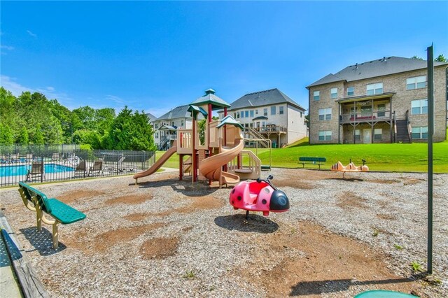 5121 Hope Ct SW, Lilburn, GA 30047 - communal playground with a residential view