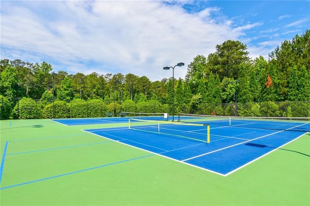 5121 Hope Ct SW, Lilburn, GA 30047 - view of tennis court featuring community basketball court and a view of trees