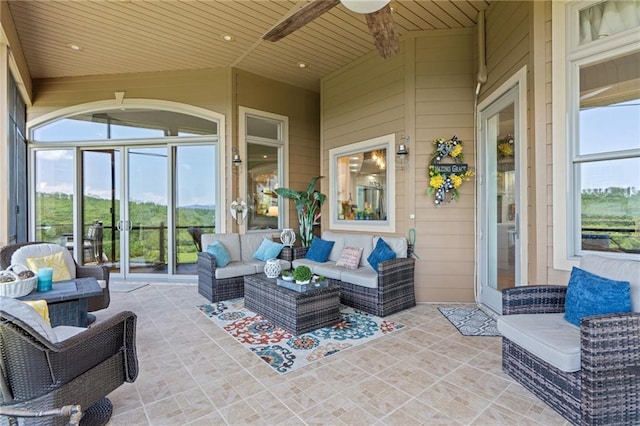 view of patio with ceiling fan and outdoor lounge area