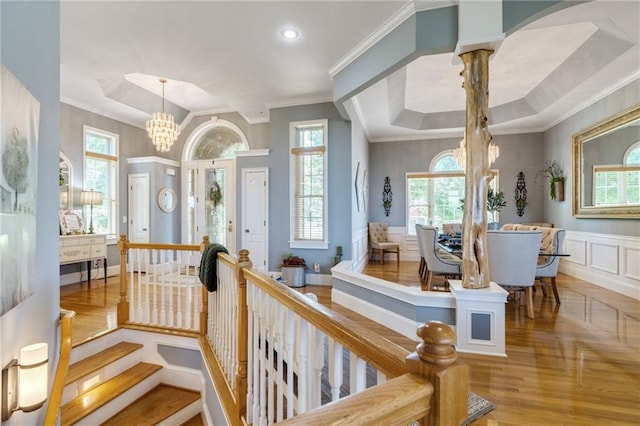 entrance foyer with a wealth of natural light and wood-type flooring