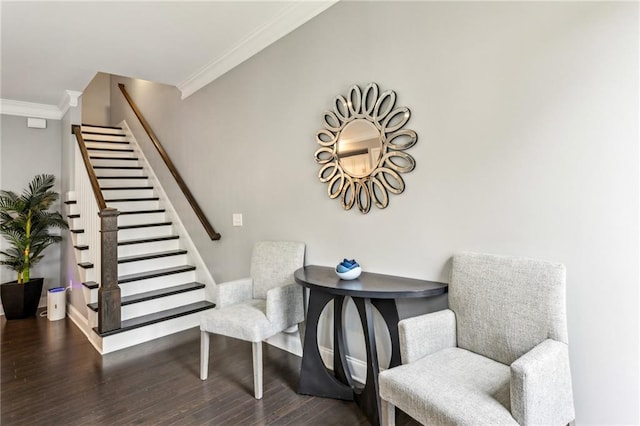 living area featuring stairway, wood finished floors, and crown molding