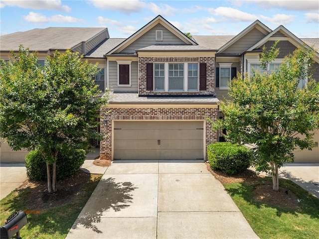 775 Duberry St, Alpharetta, GA 30004 - view of front of house featuring brick siding, an attached garage, driveway, and a shingled roof