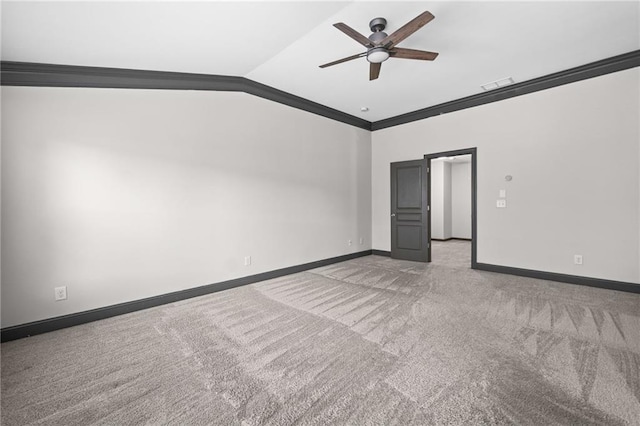 775 Duberry St, Alpharetta, GA 30004 - empty room featuring carpet floors, vaulted ceiling, a ceiling fan, baseboards, and crown molding