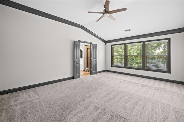 775 Duberry St, Alpharetta, GA 30004 - unfurnished bedroom with carpet floors, vaulted ceiling, baseboards, ornamental molding, and connected bathroom