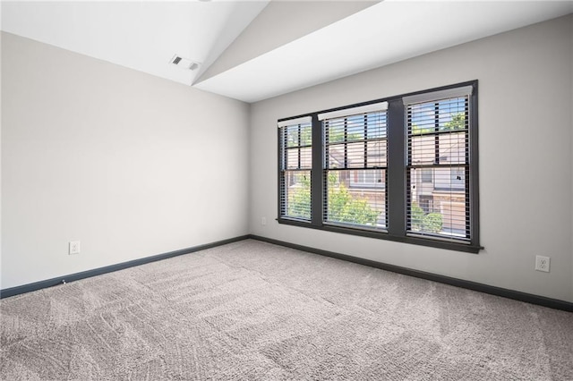 775 Duberry St, Alpharetta, GA 30004 - carpeted spare room featuring lofted ceiling and baseboards