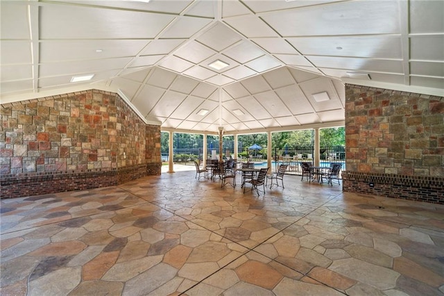 775 Duberry St, Alpharetta, GA 30004 - building lobby featuring brick wall and lofted ceiling