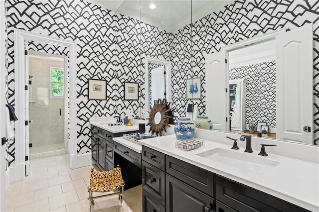 bathroom featuring tiled shower, vanity, and tile patterned floors