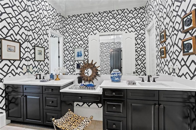 bathroom with vanity and ornamental molding