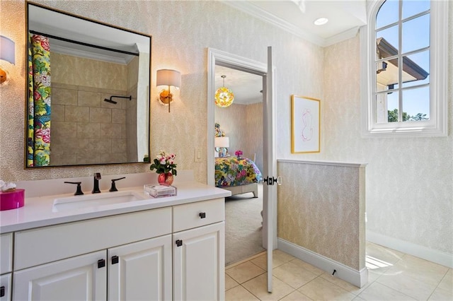 bathroom featuring vanity, tile patterned floors, ornamental molding, and a shower