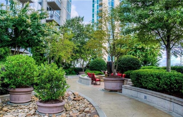 855 Peachtree St NE Unit 1311, Atlanta, GA 30308 - view of patio / terrace with an outdoor hangout area and a pergola