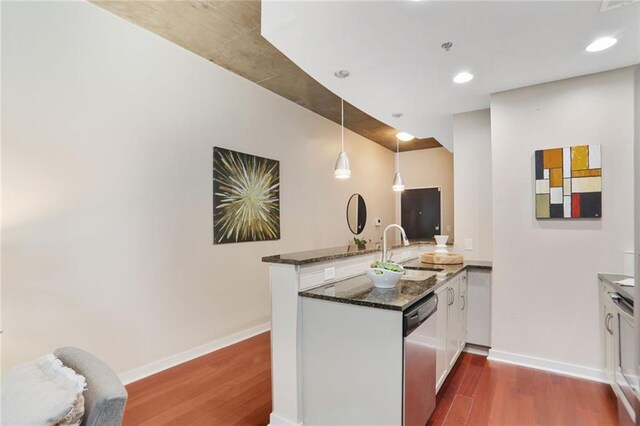 855 Peachtree St NE Unit 1311, Atlanta, GA 30308 - living room with wood finished floors, expansive windows, a ceiling fan, and baseboards
