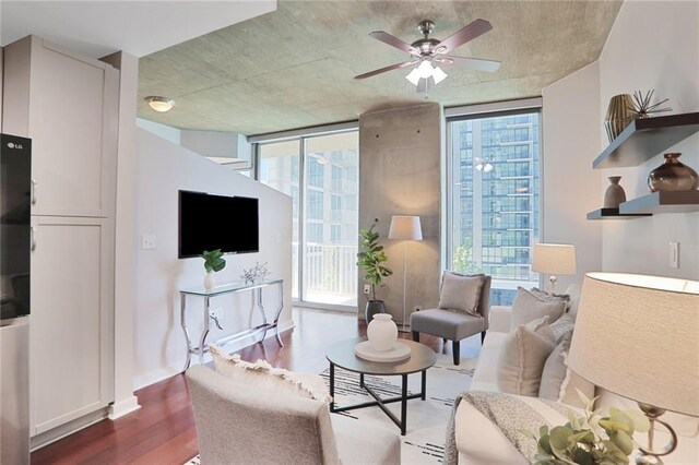 855 Peachtree St NE Unit 1311, Atlanta, GA 30308 - living room with dark wood-type flooring, ceiling fan, baseboards, and recessed lighting