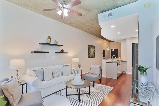855 Peachtree St NE Unit 1311, Atlanta, GA 30308 - living room with dark wood-style flooring, ceiling fan, and baseboards