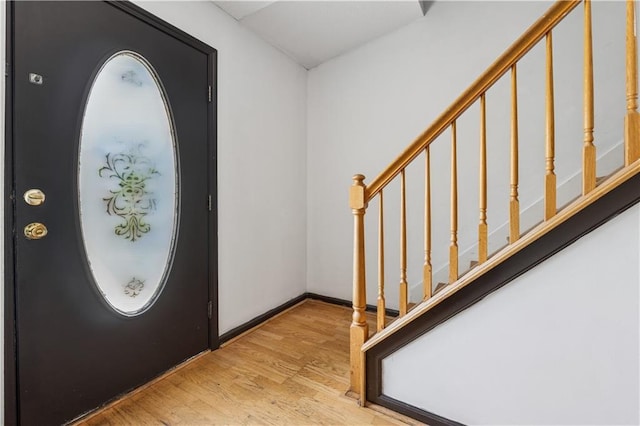 475 Shadetree Ln, Lawrenceville, GA 30044 - foyer entrance featuring stairs, wood finished floors, and baseboards