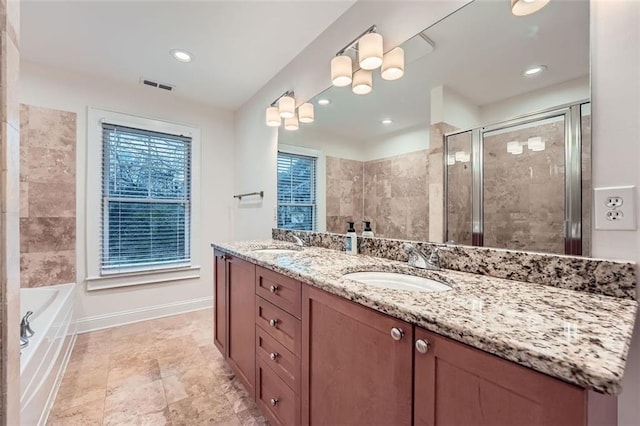 bathroom with vanity and plus walk in shower