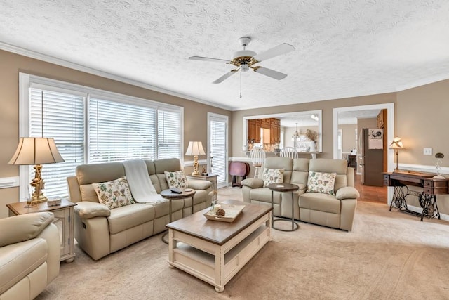 3574 Timberloch Trl, Snellville, GA 30039 - living area featuring a ceiling fan, light carpet, crown molding, and a textured ceiling