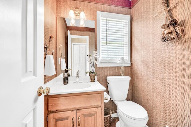 3574 Timberloch Trl, Snellville, GA 30039 - bathroom featuring wallpapered walls, vanity, and toilet