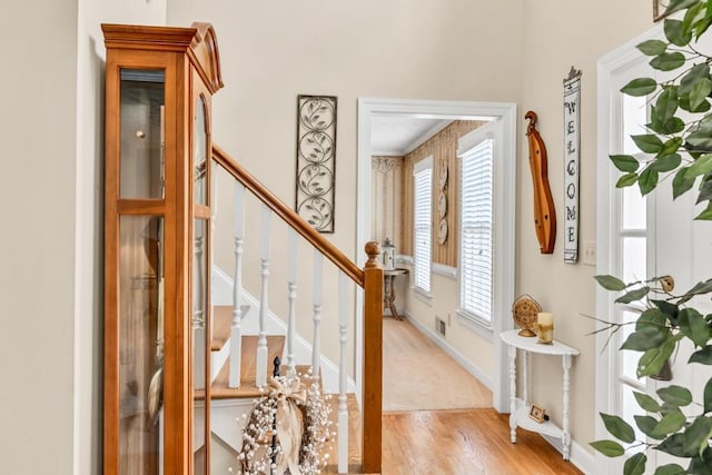 3574 Timberloch Trl, Snellville, GA 30039 - foyer entrance with stairs, wood finished floors, and baseboards
