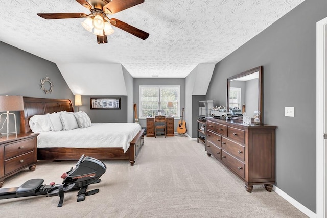 3574 Timberloch Trl, Snellville, GA 30039 - bedroom featuring light colored carpet, a textured ceiling, baseboards, and a ceiling fan