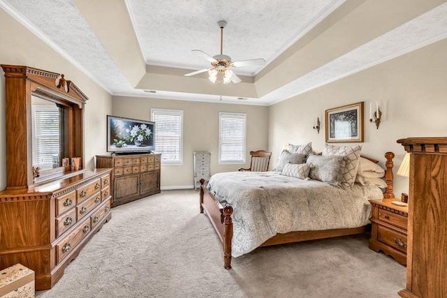 3574 Timberloch Trl, Snellville, GA 30039 - bedroom featuring a tray ceiling, light carpet, crown molding, baseboards, and a ceiling fan