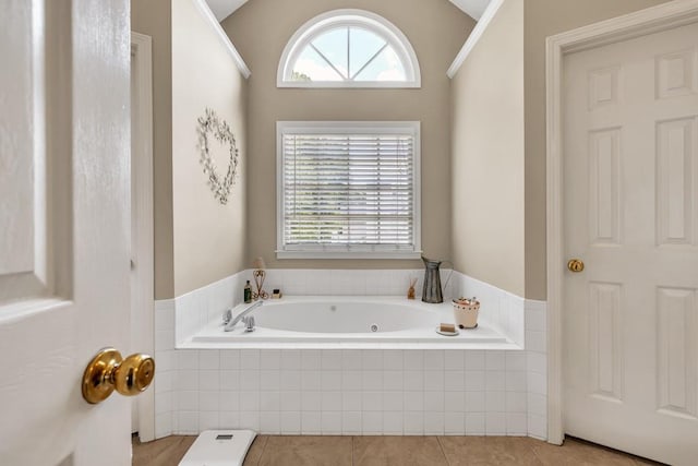 3574 Timberloch Trl, Snellville, GA 30039 - bathroom with a whirlpool tub, tile patterned floors, and lofted ceiling