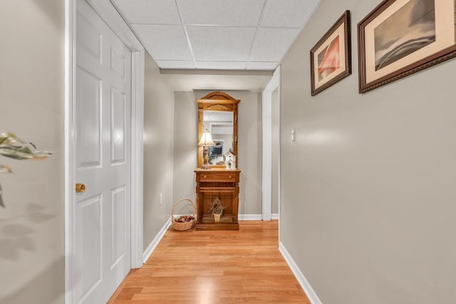3574 Timberloch Trl, Snellville, GA 30039 - hall featuring a drop ceiling, light wood finished floors, and baseboards