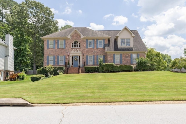 3574 Timberloch Trl, Snellville, GA 30039 - view of front of house featuring a front yard and brick siding