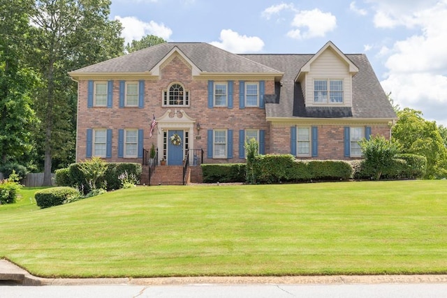 3574 Timberloch Trl, Snellville, GA 30039 - view of front of home featuring a front yard and brick siding