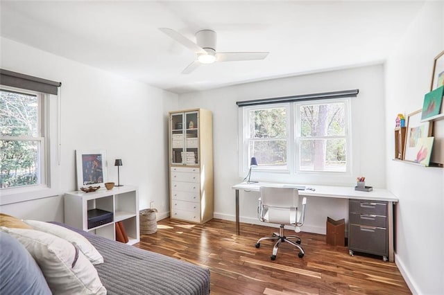 bedroom with hardwood / wood-style flooring, baseboards, and ceiling fan