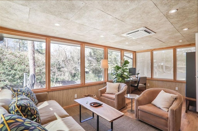 sunroom featuring visible vents