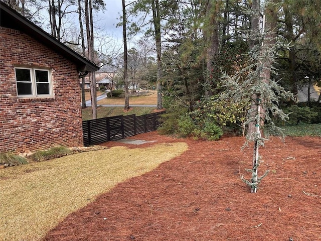 view of yard featuring fence