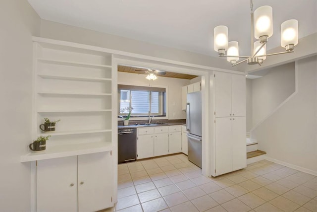 kitchen with black dishwasher, open shelves, freestanding refrigerator, white cabinets, and a sink