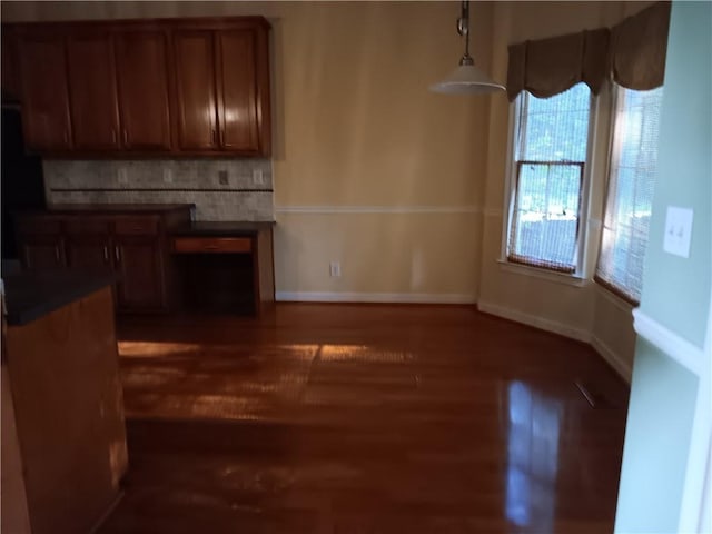 interior space with dark hardwood / wood-style floors