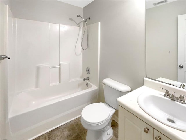 bathroom featuring vanity, visible vents, tile patterned floors, toilet, and shower / bathtub combination