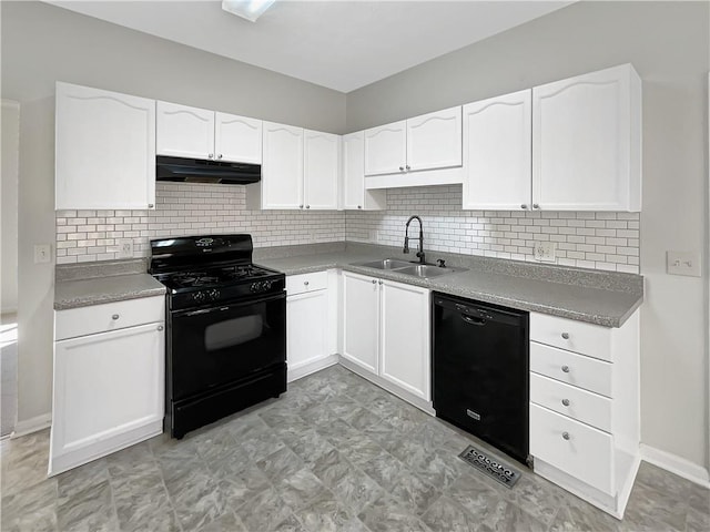 kitchen with black appliances, white cabinets, under cabinet range hood, and a sink