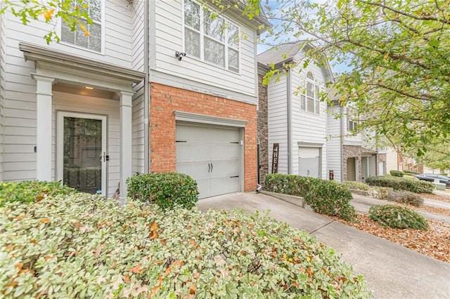 view of property exterior with a garage