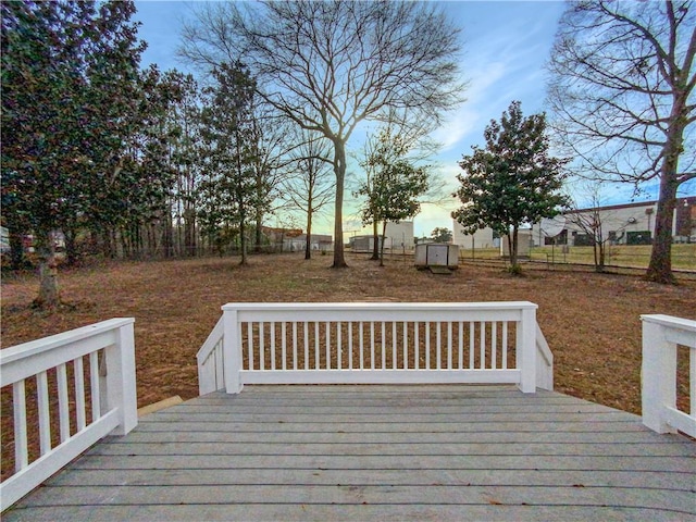 wooden deck featuring fence