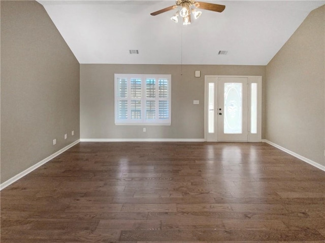 unfurnished living room with baseboards, wood finished floors, and a ceiling fan