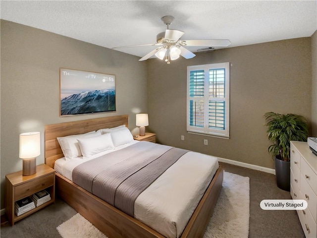 bedroom featuring carpet flooring, baseboards, and ceiling fan