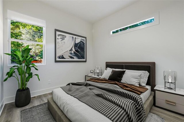 bedroom featuring light hardwood / wood-style flooring