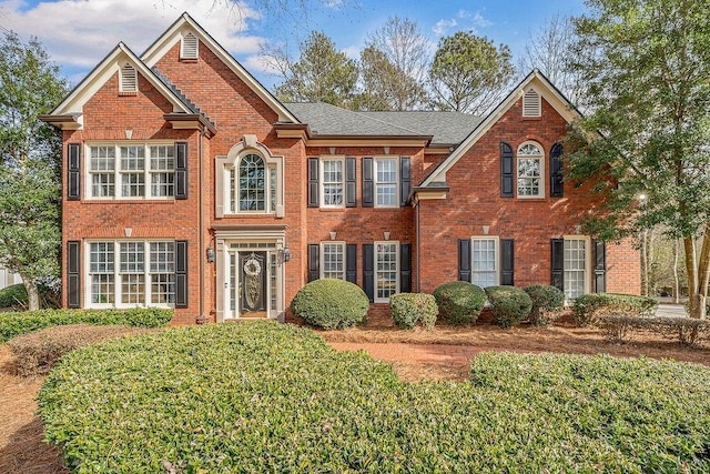 view of front of home with brick siding