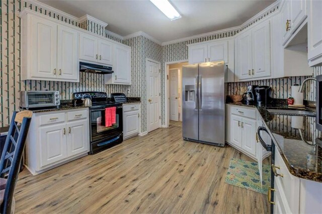 500 Nicole Ct SE, Conyers, GA 30094 - kitchen featuring white cabinets, electric range, and stainless steel fridge with ice dispenser