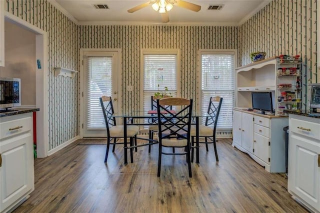 500 Nicole Ct SE, Conyers, GA 30094 - dining room featuring hardwood / wood-style flooring, ornamental molding, and a healthy amount of sunlight