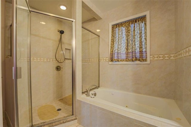 500 Nicole Ct SE, Conyers, GA 30094 - bathroom featuring separate shower and tub