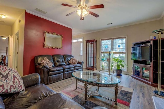 500 Nicole Ct SE, Conyers, GA 30094 - living room featuring crown molding, ceiling fan, and light wood-type flooring