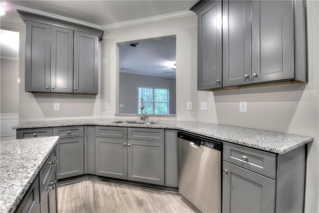 kitchen featuring gray cabinetry, crown molding, dishwasher, and light wood-type flooring