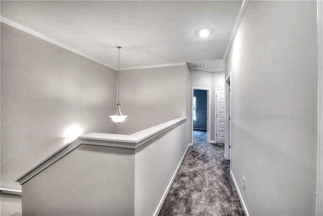 hallway featuring dark carpet and ornamental molding