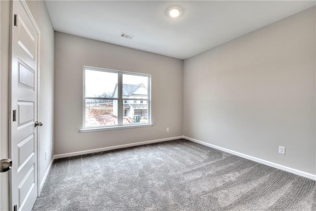 view of carpeted spare room